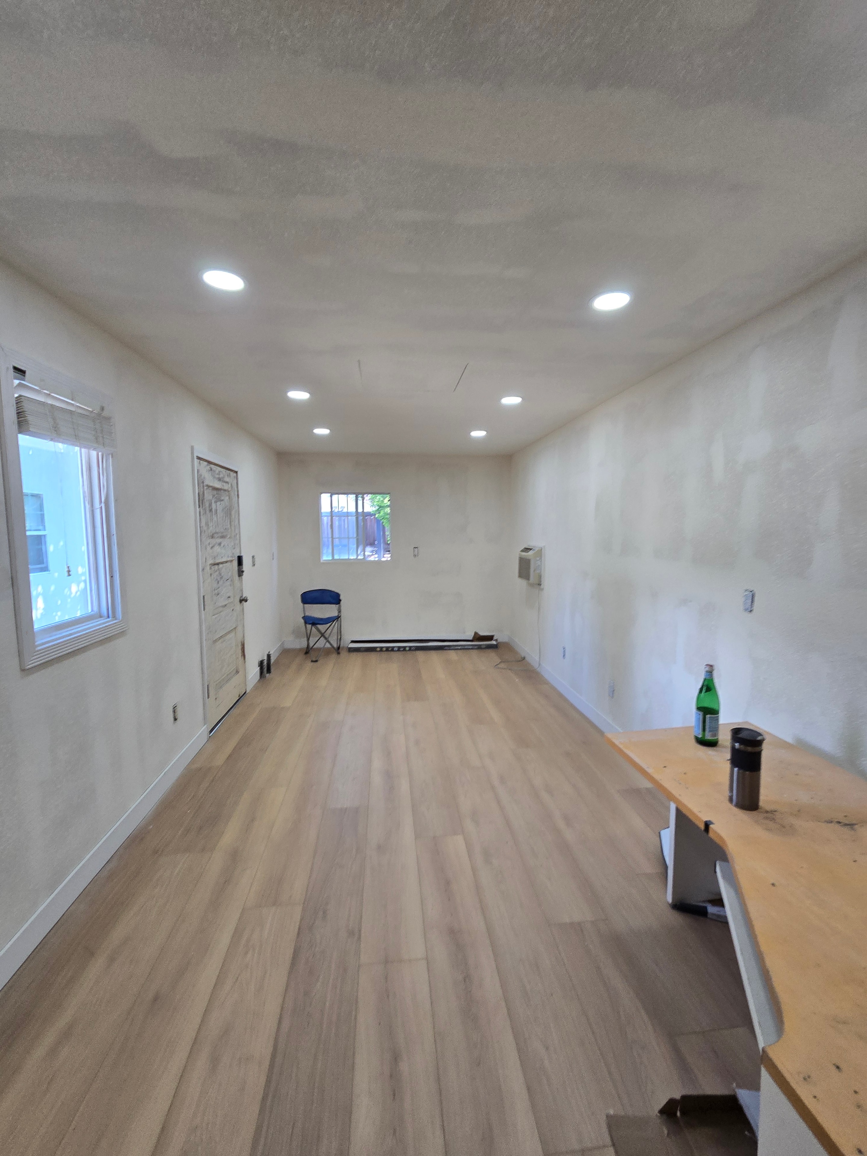Kitchen remodel with quartz countertops and patterned backsplash
