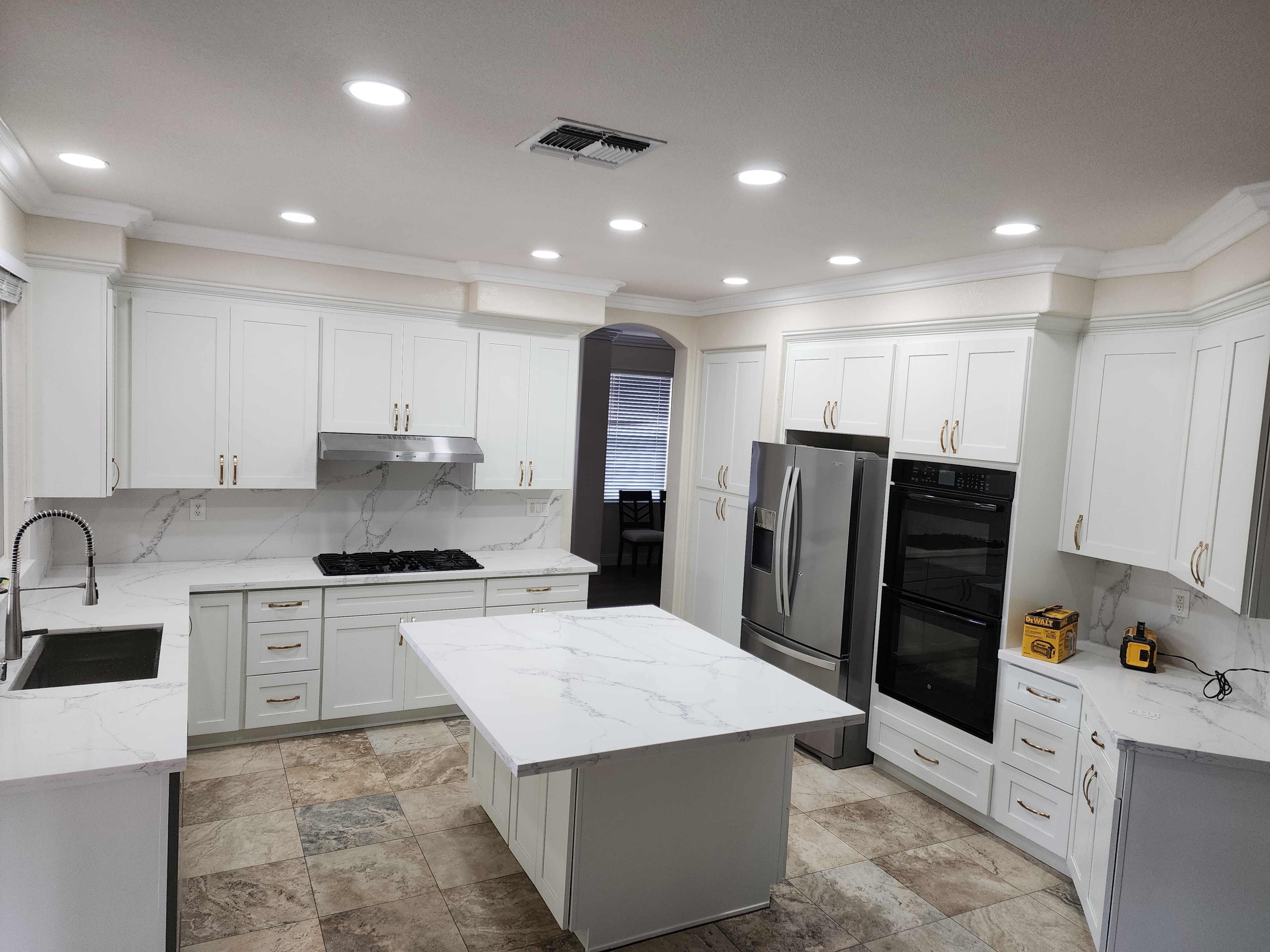 Kitchen remodel with hardwood floors and quartz countertops
